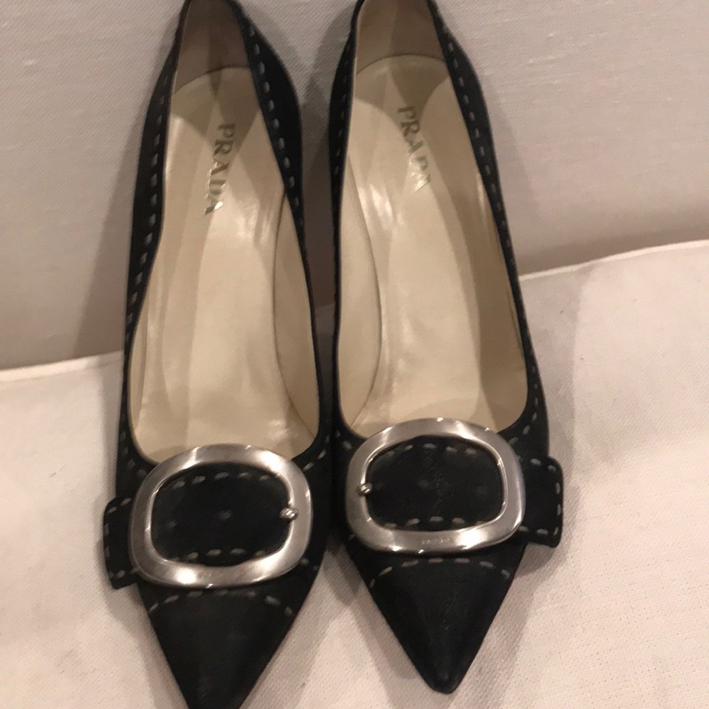 Prada pumps brass buckle and top stitching